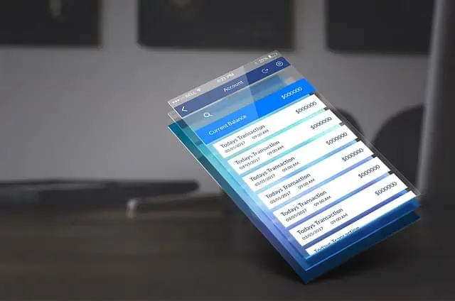 Un téléphone portable avec un écran bleu dessus.